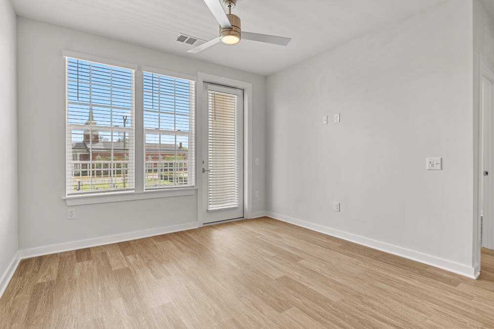 Living room with large window and natural light at The Cascade at Foundry Creek in Richmond, Virginia
