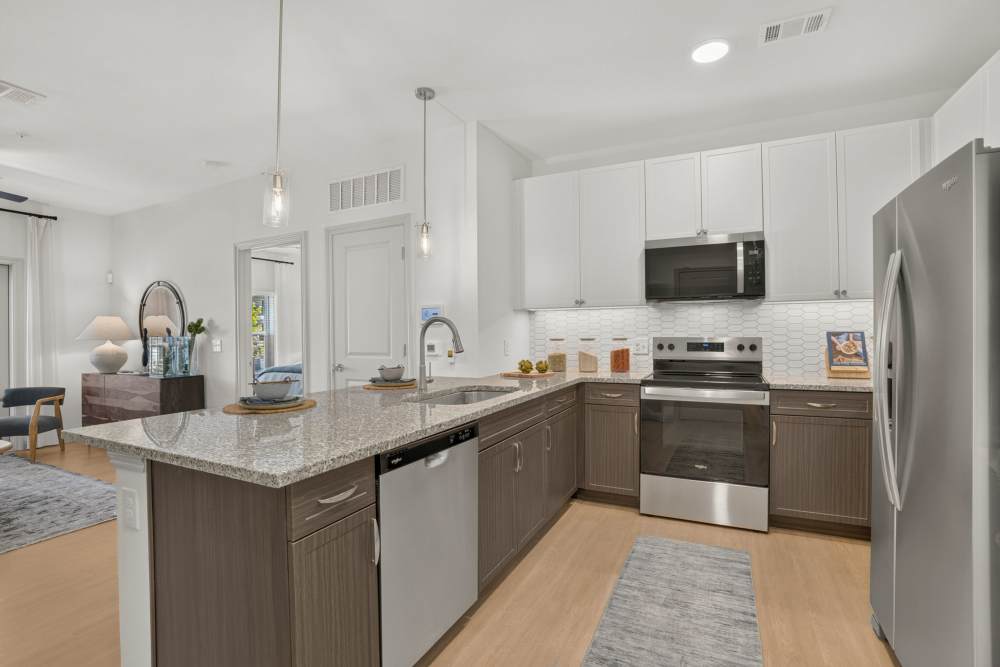 Island kitchen with plenty of cabinet and counter space at Fidelis Willis.