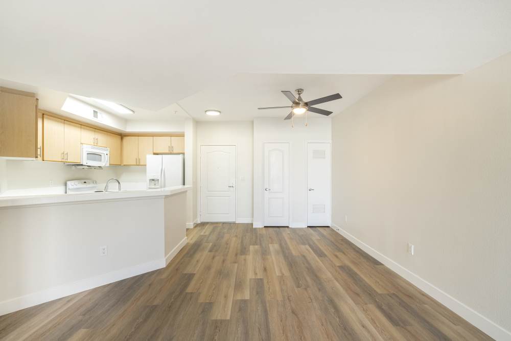 Wood-style flooring in open layout kitchen at St Tropez Apartments in Marina Del Rey, California