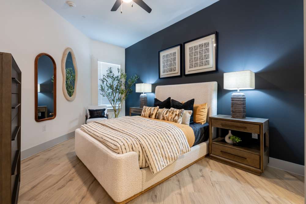 Light-filled bedroom with connected bathroom and large walk-in closet  at Winston Heights.