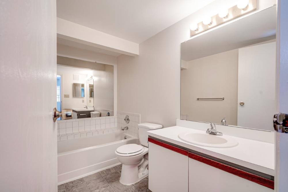 Bathroom with vanity and bathtub at Carriage Court in Cincinnati, Ohio