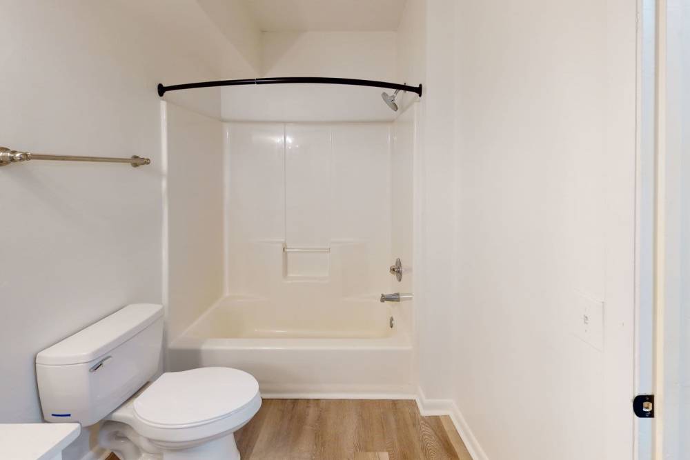 Bathroom with bath tub at Wallace Terrace Apartments in Charlotte, North Carolina