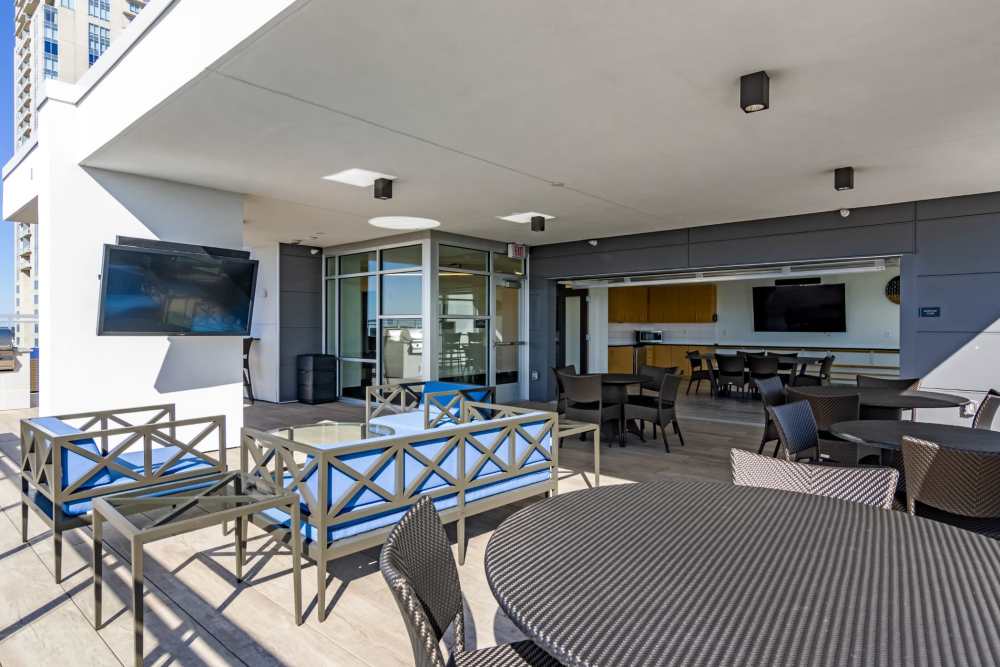 Glass wall with seating area at The Residences at Town Center in Virginia Beach, Virginia
