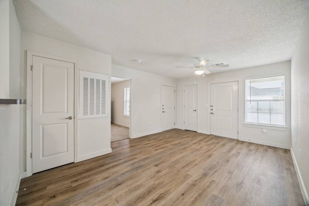 Spacious living room at Meadowbrook Plaza in Houston, Texas