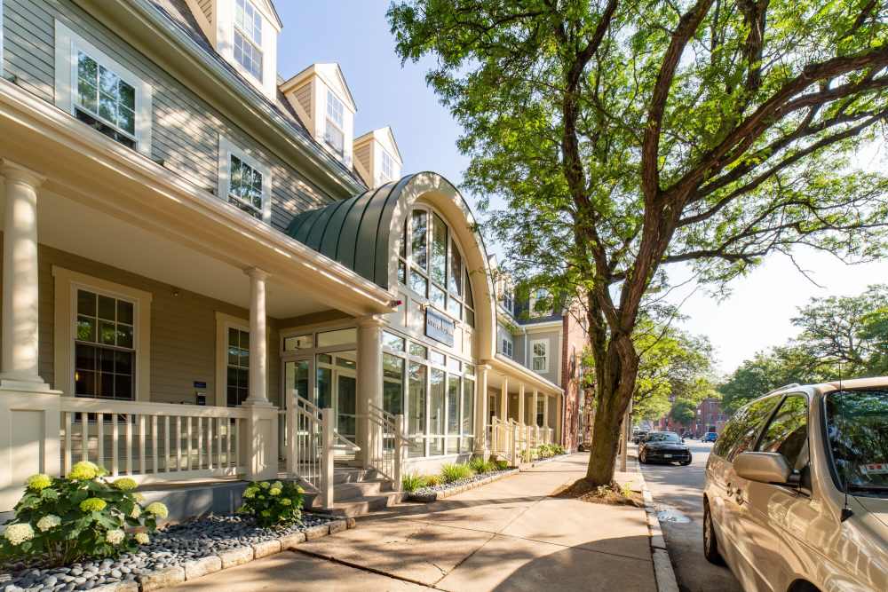 Gated entrance with landscaped path at The Charlestown in Charlestown, Massachusetts