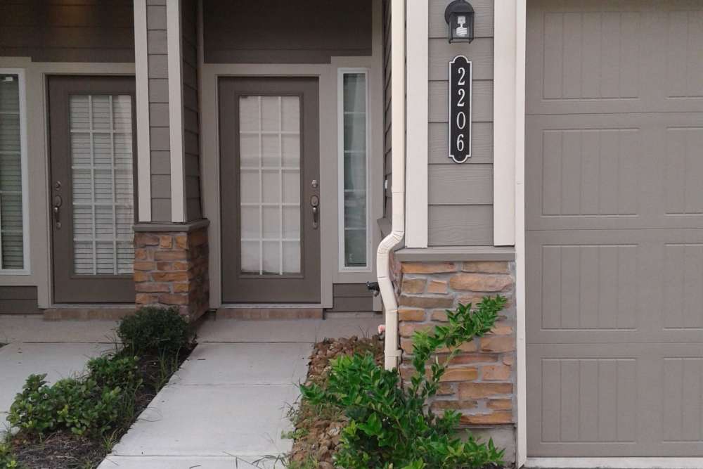 Front door with number 2206 at 36 Palms Townhomes in Missouri City, Texas
