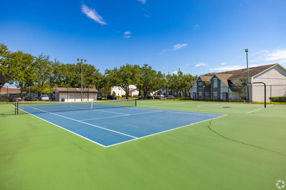 Tennis courts with green and blue surfaces at Highpoint Club in Orlando, Florida