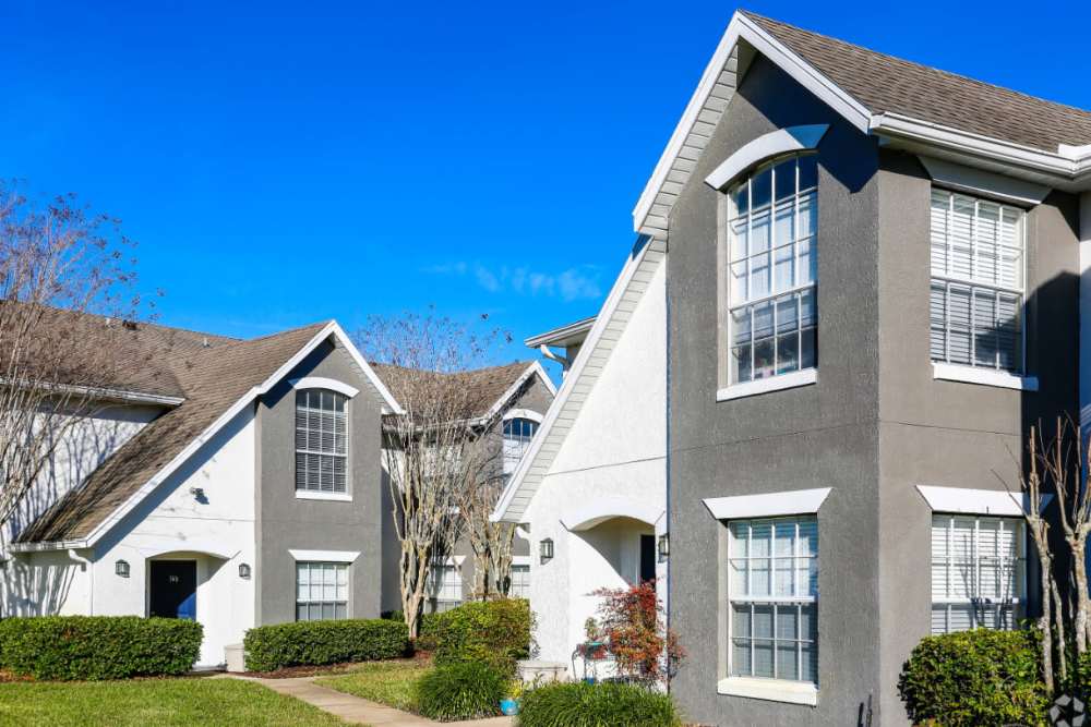Welcoming apartment exteriors with lush landscaping at Highpoint Club in Orlando, Florida