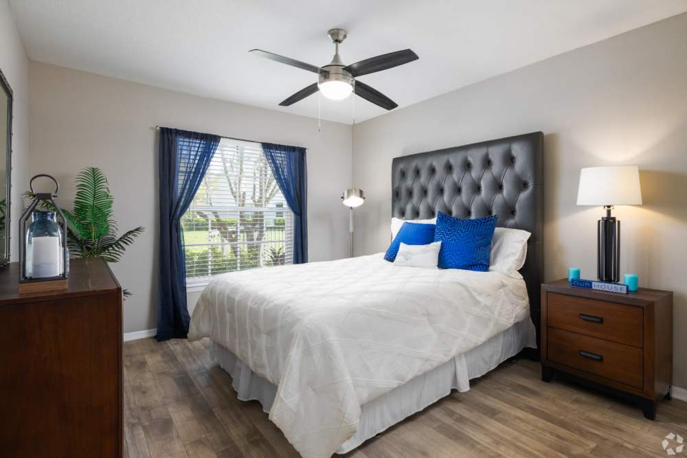 Cozy bedroom with natural light at Highpoint Club in Orlando, Florida