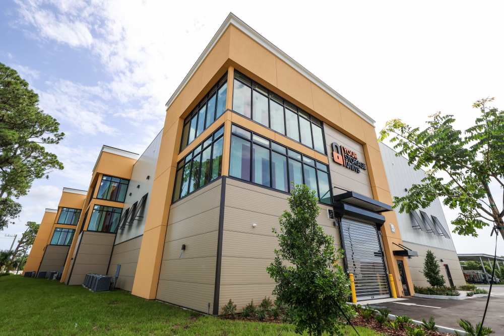 Modern storage facility corner exterior with glass windows  at Your Storage Units Ft Pierce in Fort Pierce, Florida