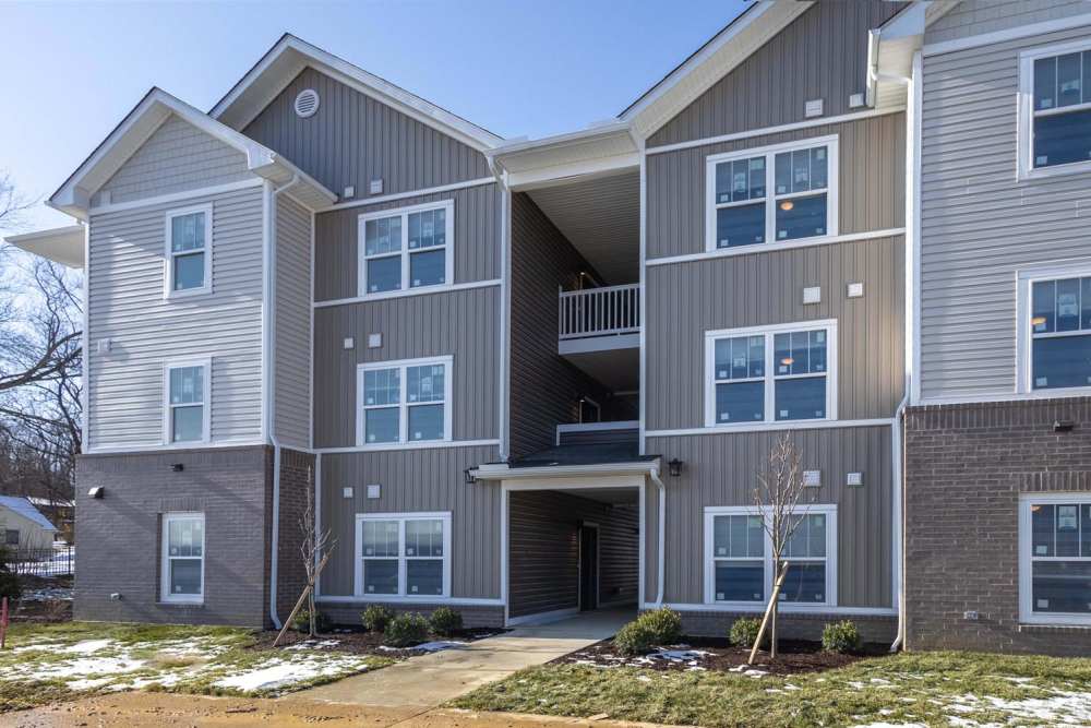 Building exterior with landscaped entrance at Sells Greene in Lancaster, Ohio