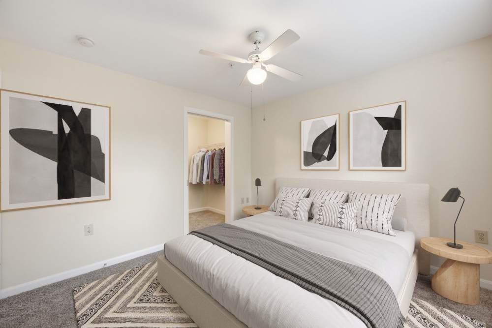 Large bedroom with attached closet at Waverly Gardens in Woodstock, Maryland