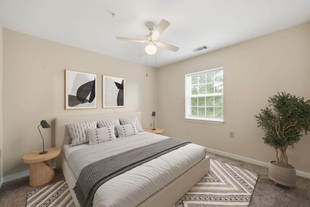 Well-lit bedroom at Waverly Gardens in Woodstock, Maryland