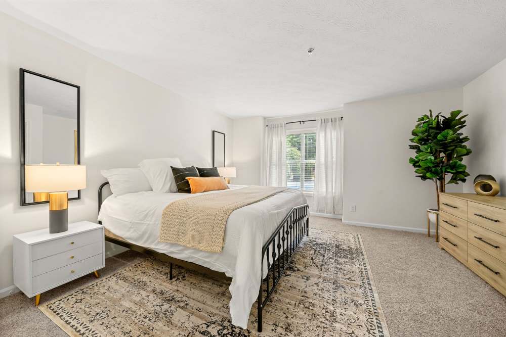 Bedroom with modern details at Brush Factory Lofts in Philadelphia, Pennsylvania