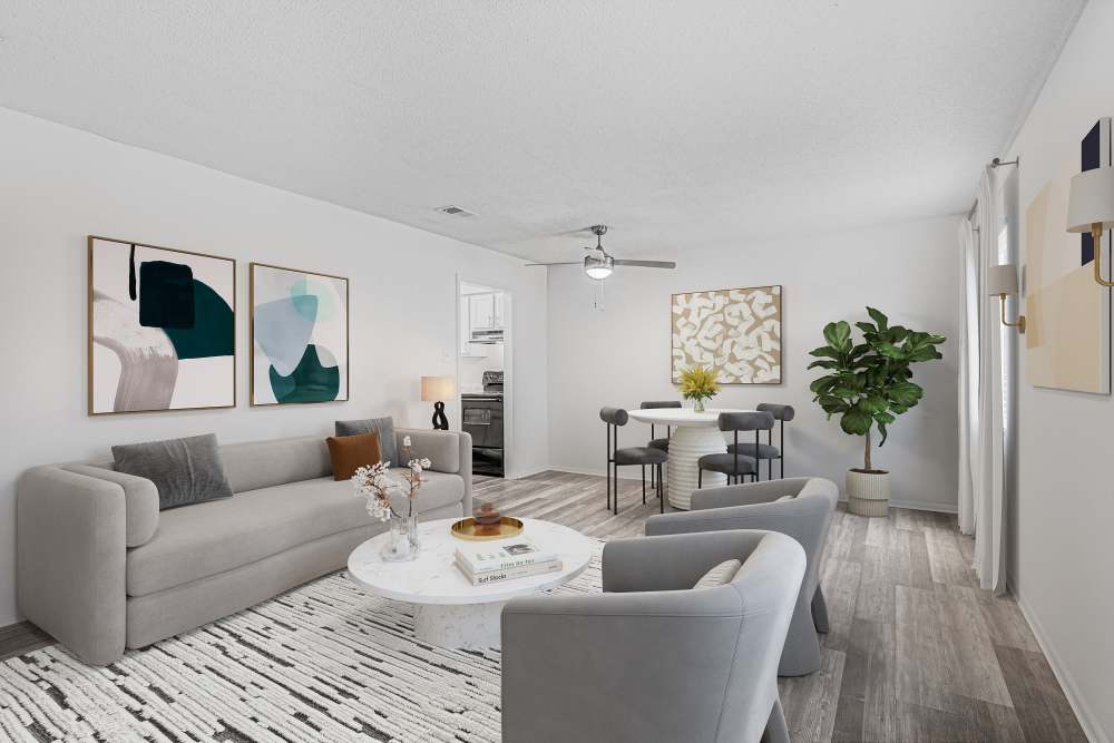 Living room with seating and dining area at Crescent Place in Savannah, Georgia
