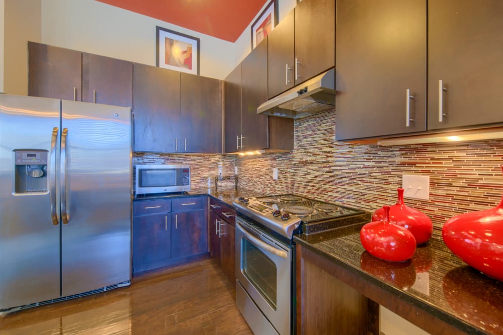Stainless steel refrigerator and red decor at Midway Station in Midland, Texas