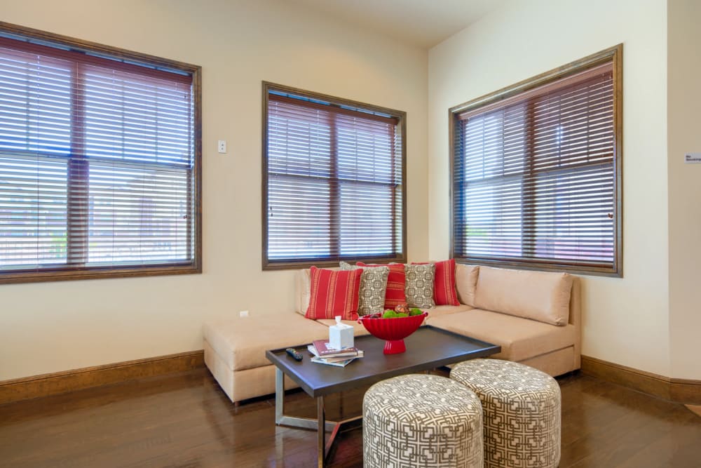 Wooden window frames with blinds and cushions at Midway Station in Midland, Texas