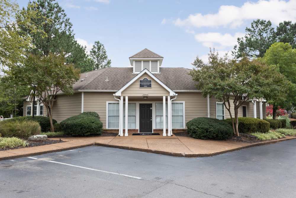 Tan building with dark door and windows at Stonebridge Crossing Apartment Homes in Cordova, Tennessee