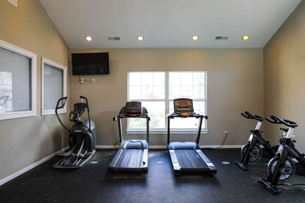 Fitness center with treadmills at Andrews Place in Panama City, Florida