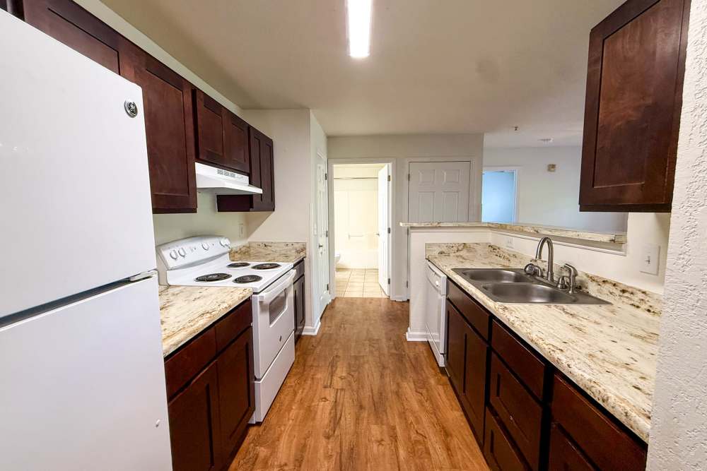 Kitchen with wooden flooring at Andrews Place in Panama City, Florida