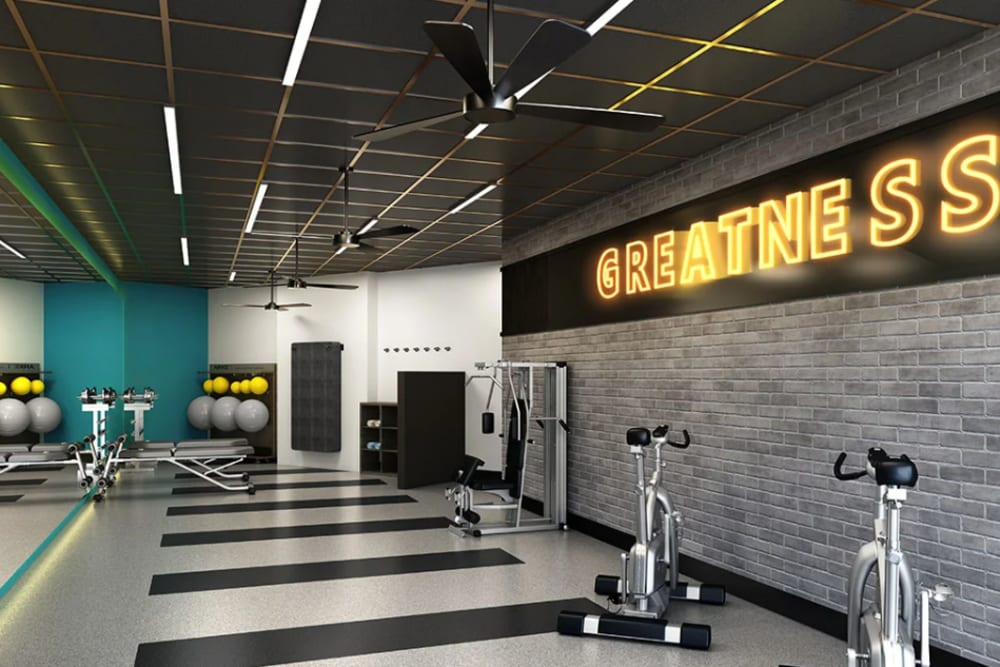 Fitness center with weights and bikes at River Point West in Elkhart, Indiana