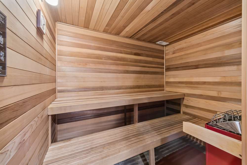 Cedar sauna with wood benches at Fieldstone in Fairview, Oregon.