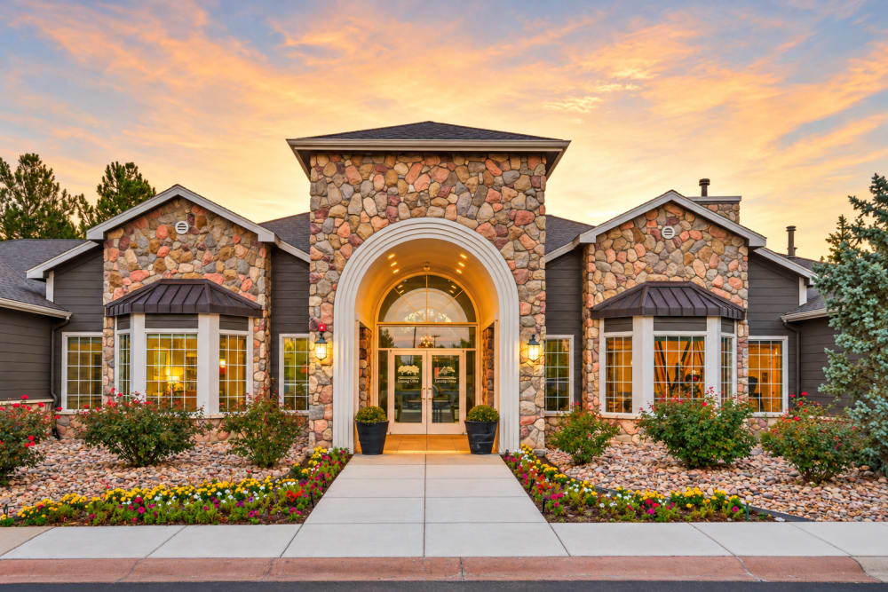 Exterior view at night of at Legend Oaks Apartments in Aurora, Colorado