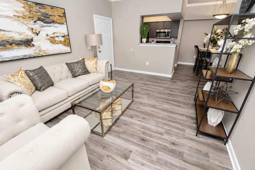 Spacious living room looking into the dining room at The Flats at Veranda Ridge.