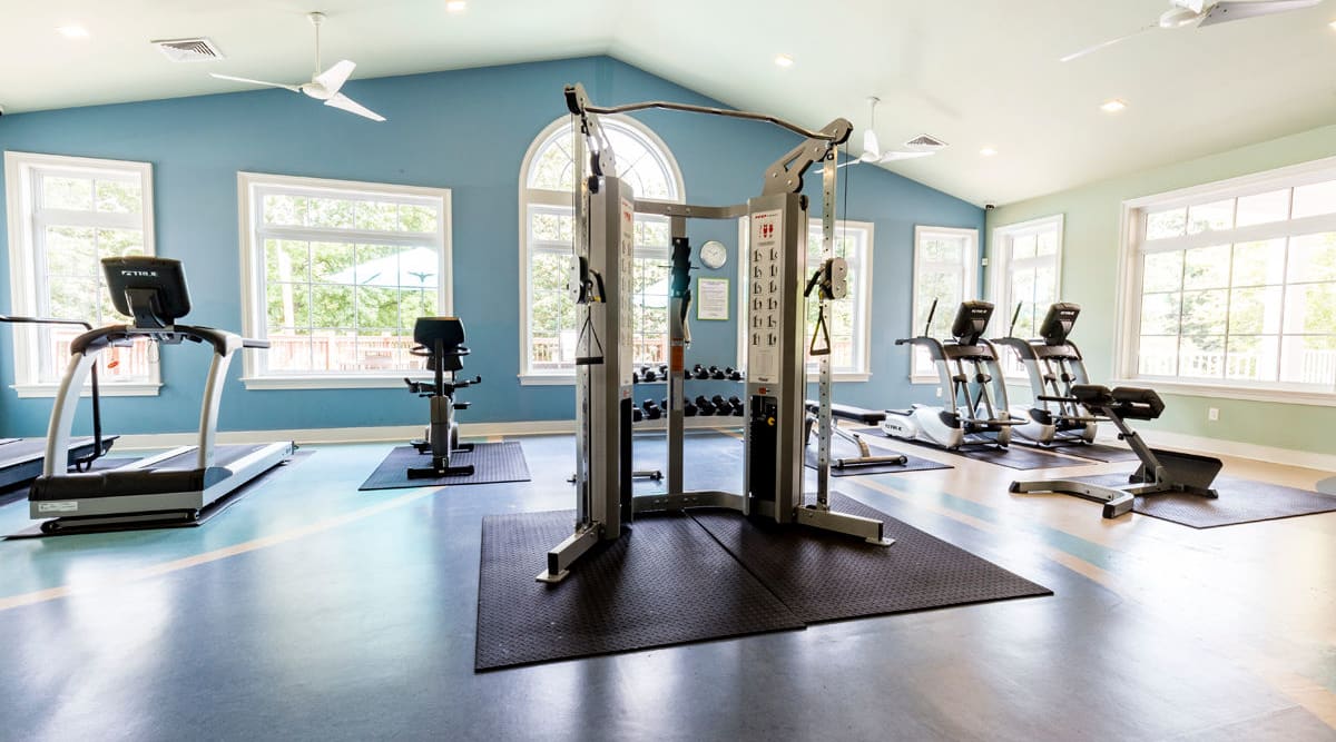 Fitness center with treadmills at Harbor Village Apartments in Richmond, Virginia