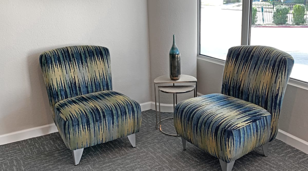 Clubhouse with stylish chairs at The View Tower Apartments, Shreveport, Louisiana