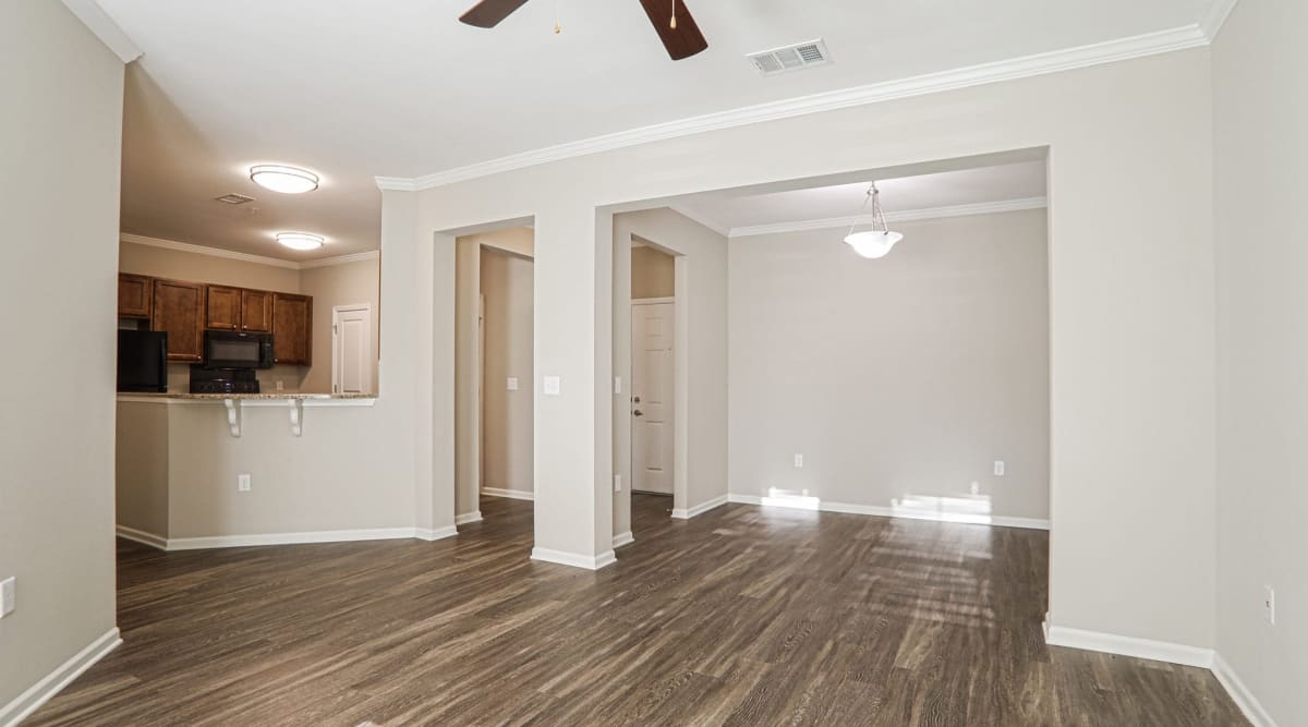 Apartment with wood-style flooring at La Maison Of Saraland, Saraland, Alabama