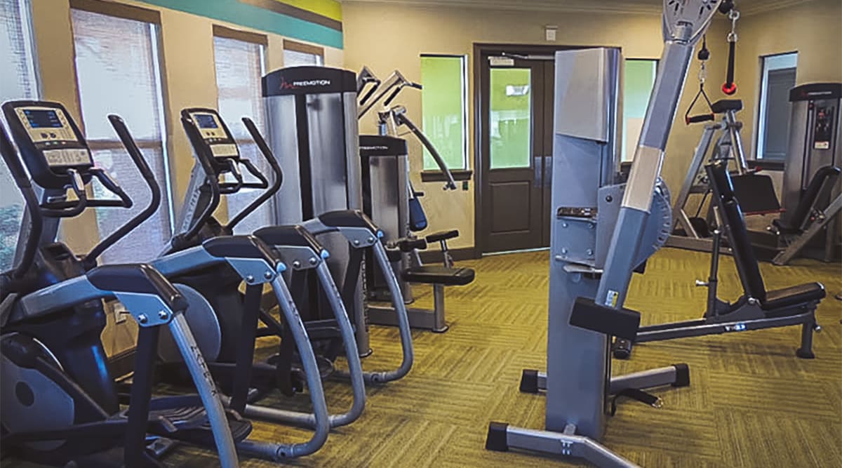 Well equipped fitness center at Le Rivage Luxury Apartments in Bossier City, Louisiana