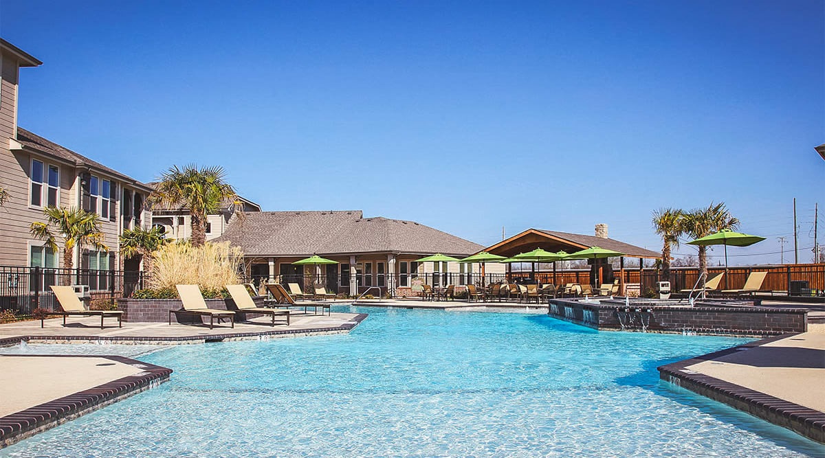 Beautiful resort-style pool at Le Rivage Luxury Apartments in Bossier City, Louisiana