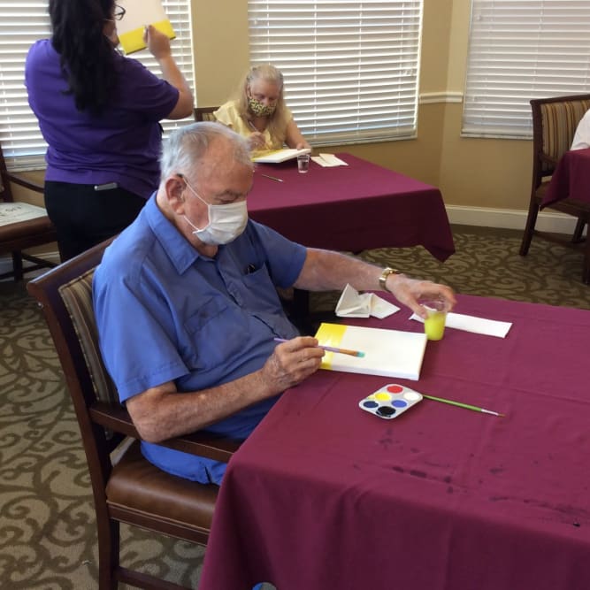 Residents painting at Grand Villa of Palm Coast in Palm Coast, Florida