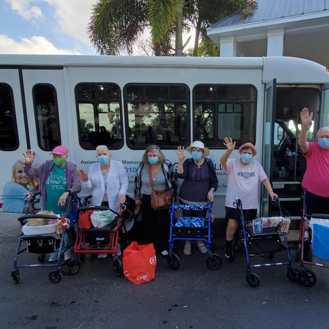 senior residents getting on the community bus