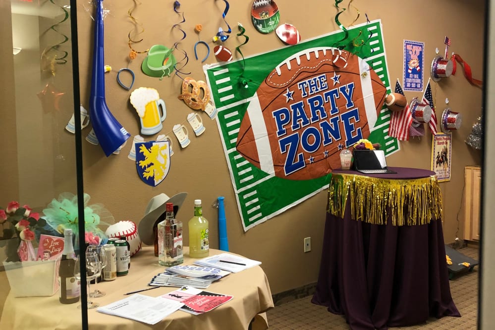 Community room decorated for football game at Ponté Palmero in Cameron Park, California