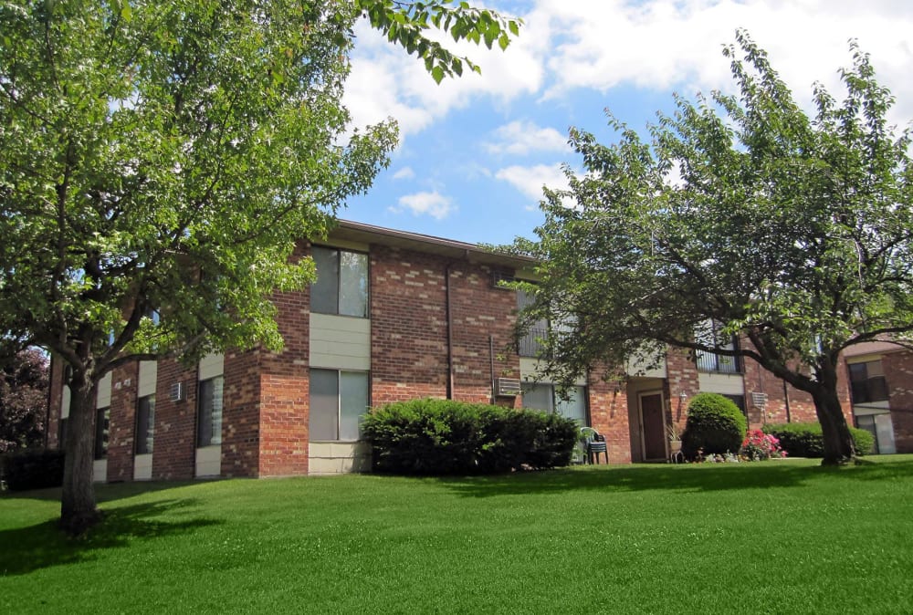 Exterior building at Crossroads Apartments & Townhomes in Spencerport, New York.