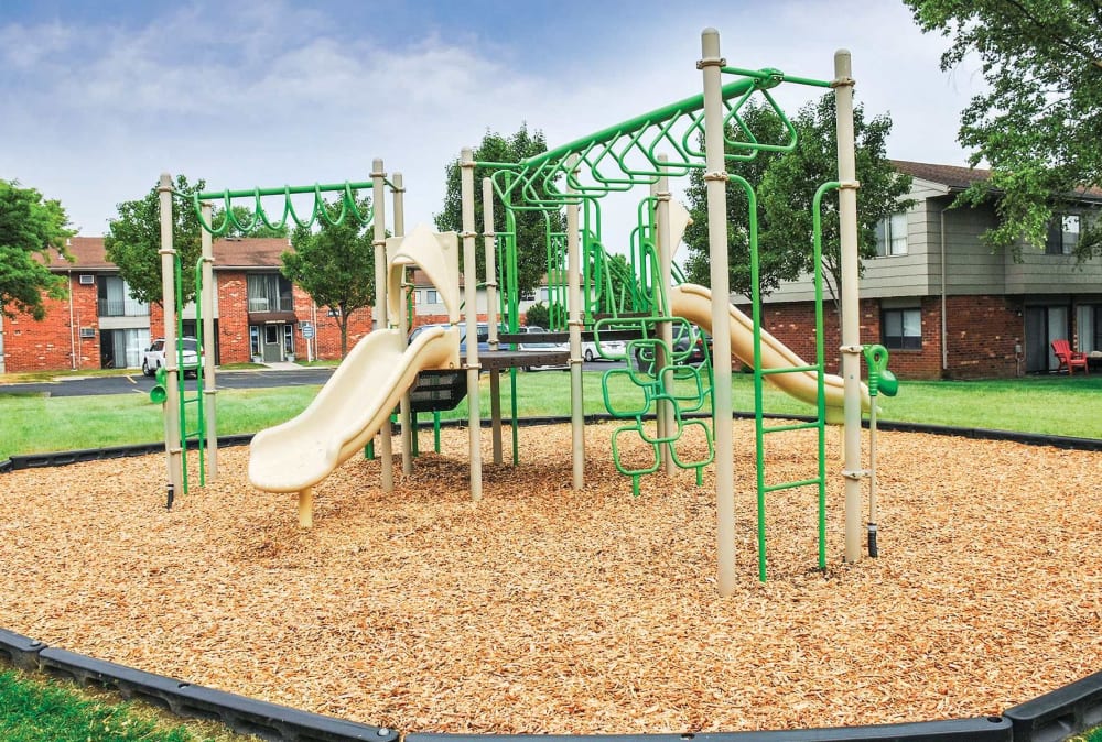 Crossroads Apartments & Townhomes offers a playground in Spencerport, New York.