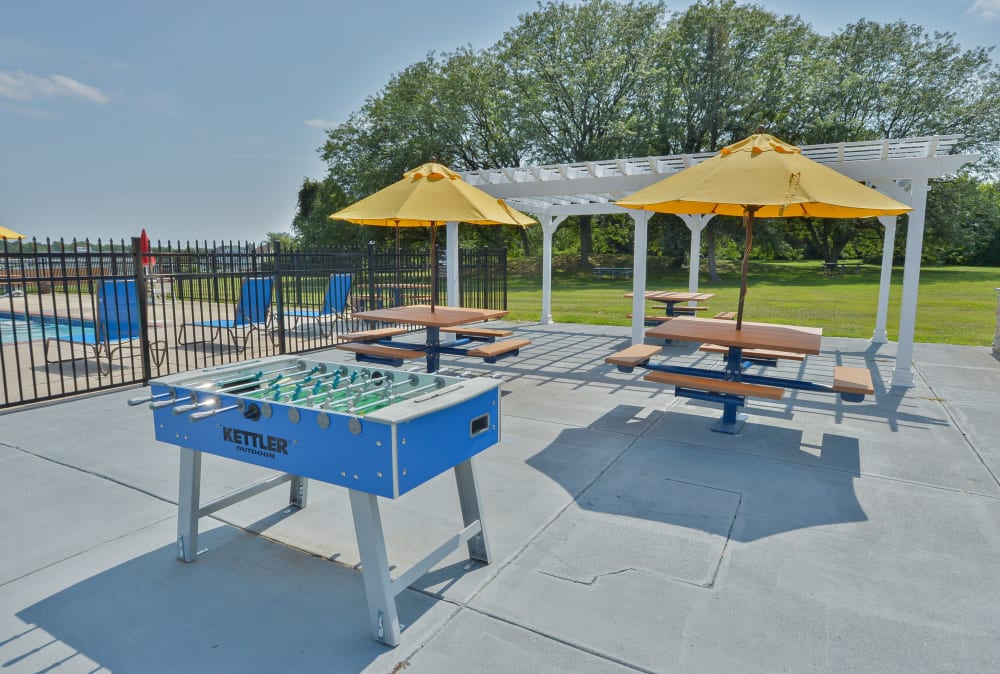 Foosball and picnic area at William Penn Village Apartment Homes in New Castle, Delaware