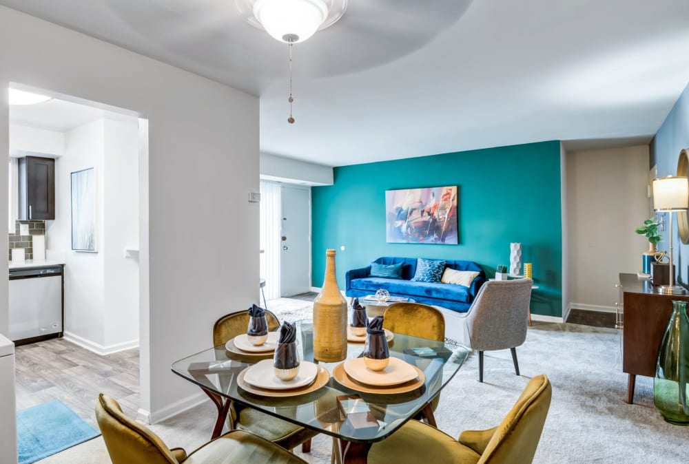 Dining area and living room of  model home at Lynbrook at Mark Center Apartment Homes in Alexandria, Virginia