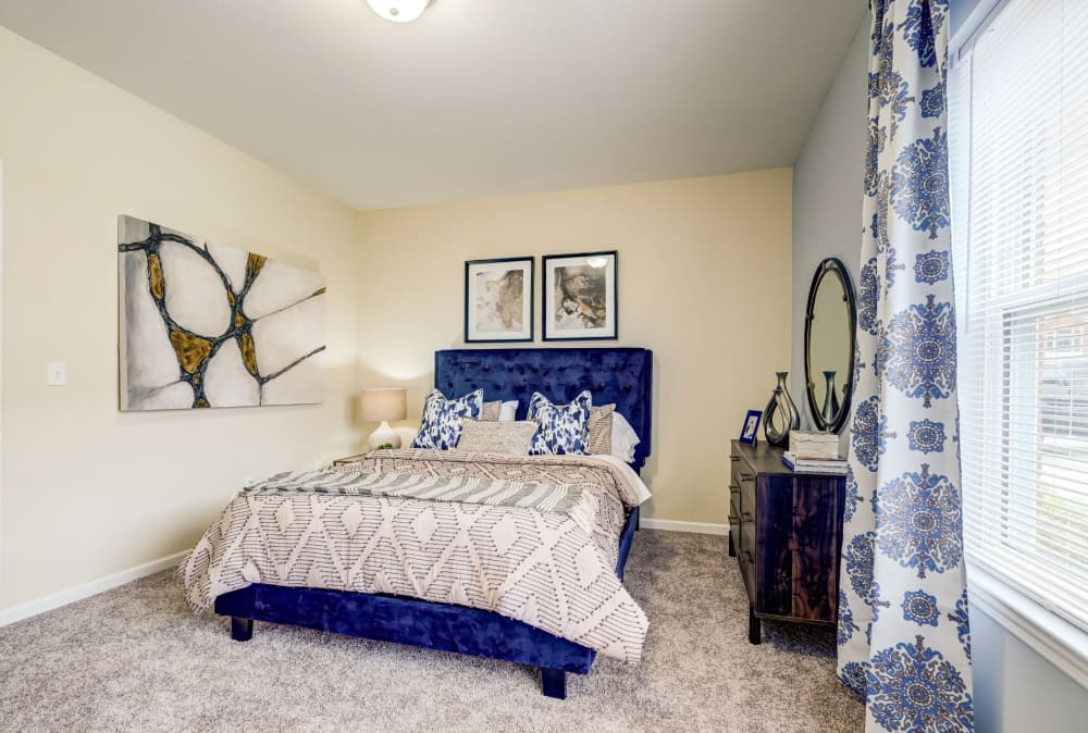 Cozy bedroom at Torrente Apartment Homes in Upper St Clair, Pennsylvania