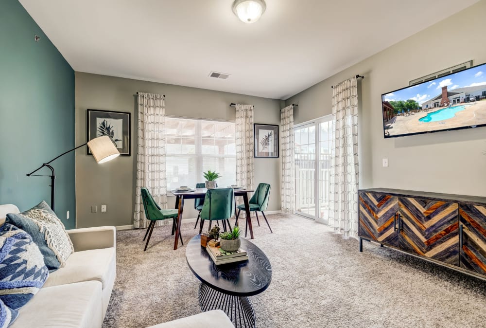 Spacious living room and dining area at Torrente Apartment Homes in Upper St Clair, Pennsylvania