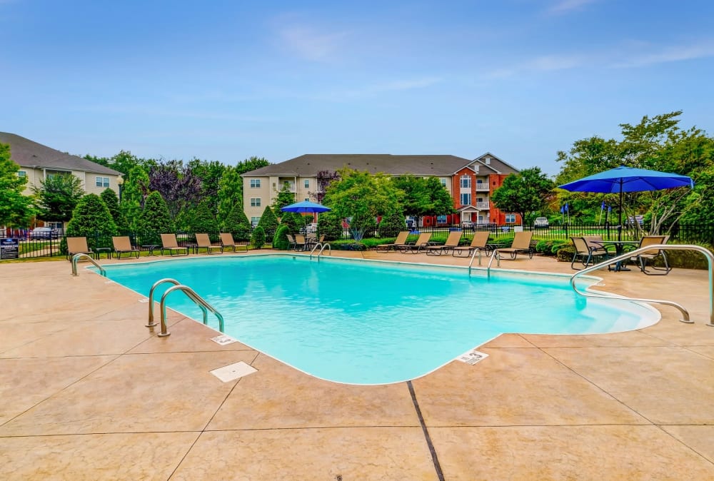 Beautiful blue sky with a luxurious pool Marquis Place in Murrysville, Pennsylvania
