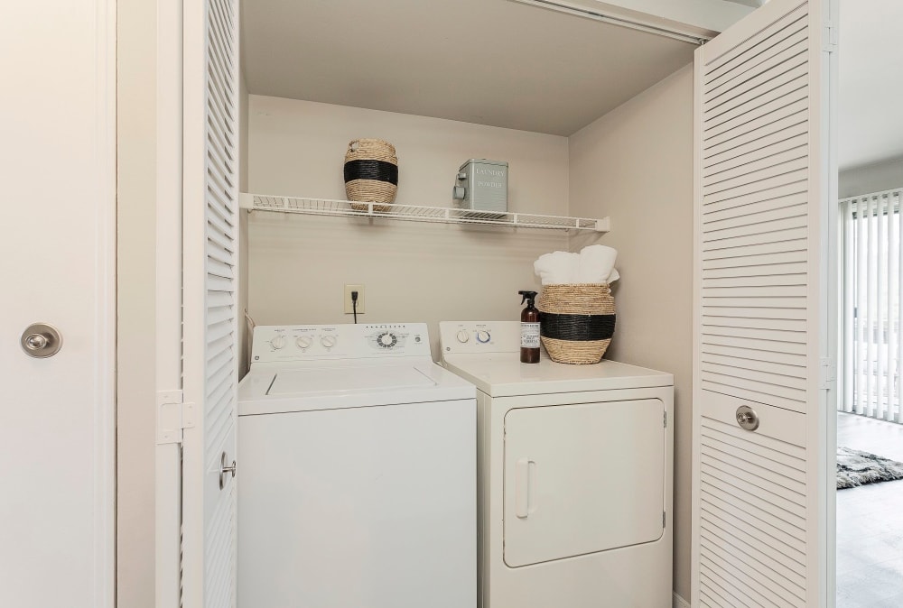 Washer and dryer combo area in apartments with utilities included located at Lakewood Apartment Homes in Salisbury, North Carolina