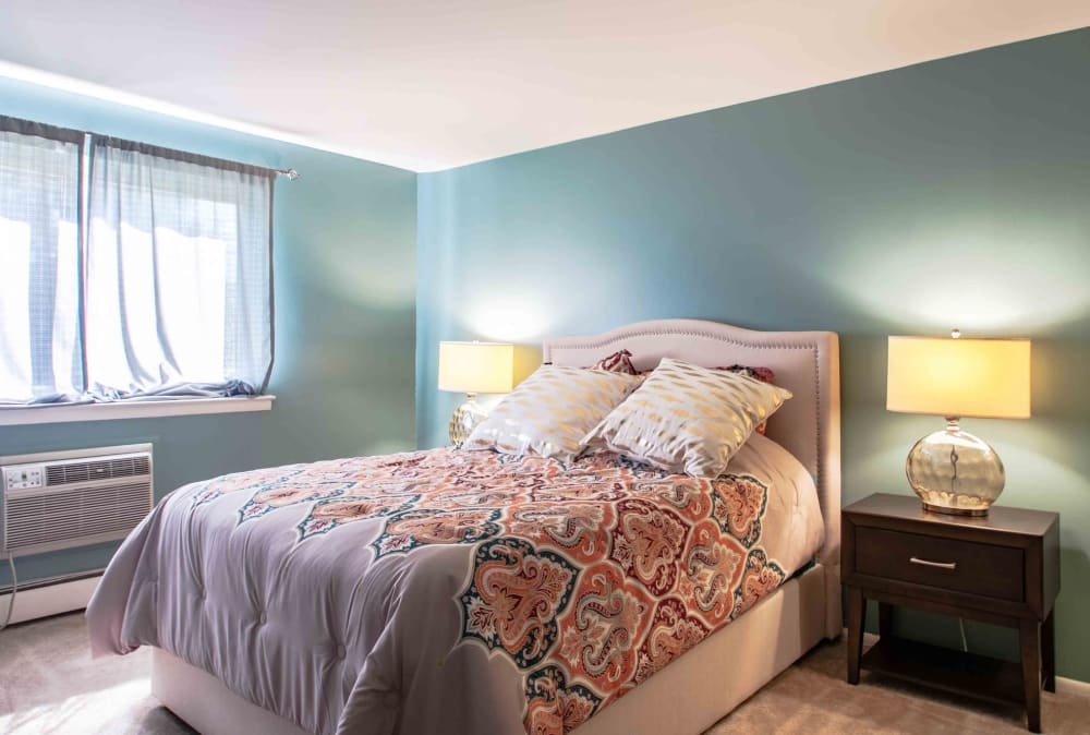 Bright bedroom at Camp Hill Plaza Apartment Homes in Camp Hill, Pennsylvania