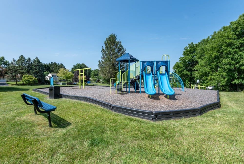 Apartments with a Playground equipped with a slide located at Henrietta Highlands in Henrietta, New York