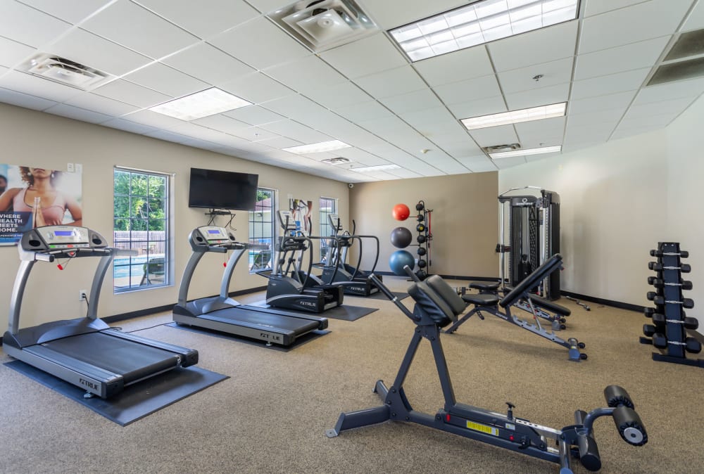 Well-equipped fitness center with cardio equipment at Jackson Grove Apartment Homes in Hermitage, Tennessee