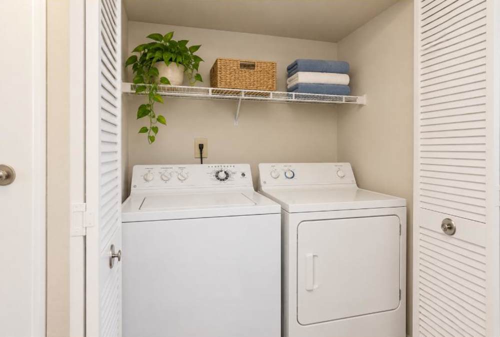 Washer and dryer combo area in apartments with utilities included located at Lakewood Apartment Homes in Salisbury, North Carolina
