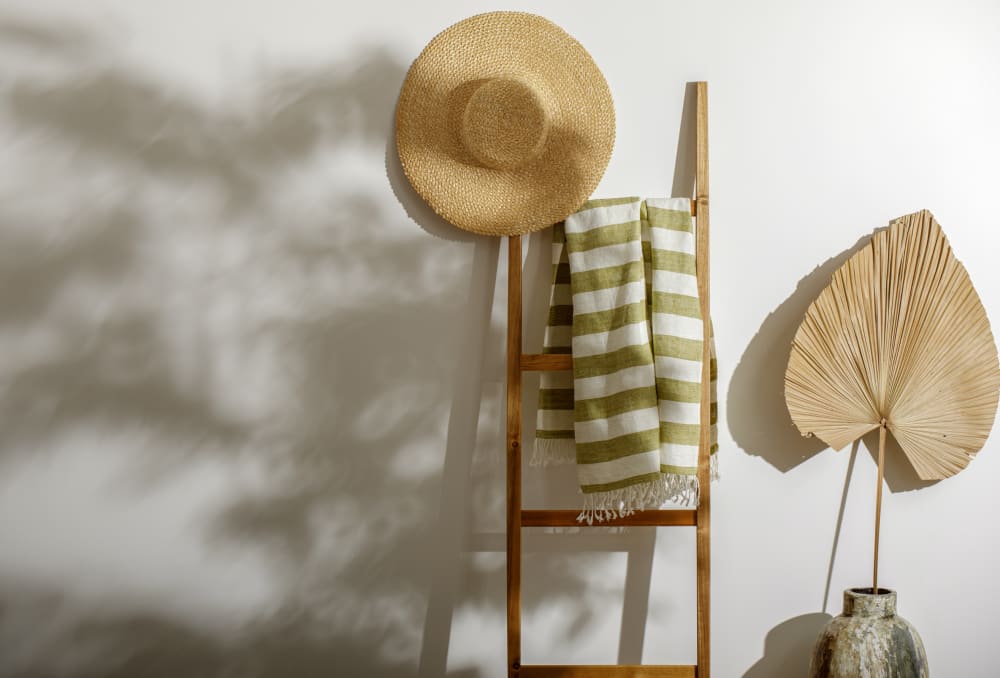  A hat placed on a wooden stool at RIVA Solana Beach in Solana Beach,California