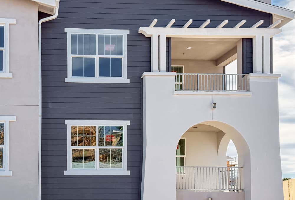 Multi-colored exterior with windows and archway at RIVA Solana Beach in Solana Beach, California
